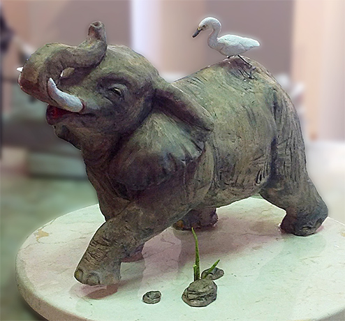 Sculpture of a bird on an elephant